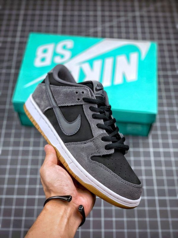 نایک اس بی دانک بدون ساق ریگنینگ چمپ مشکی طوسی Nike sb dunk low reigning champ grey and black